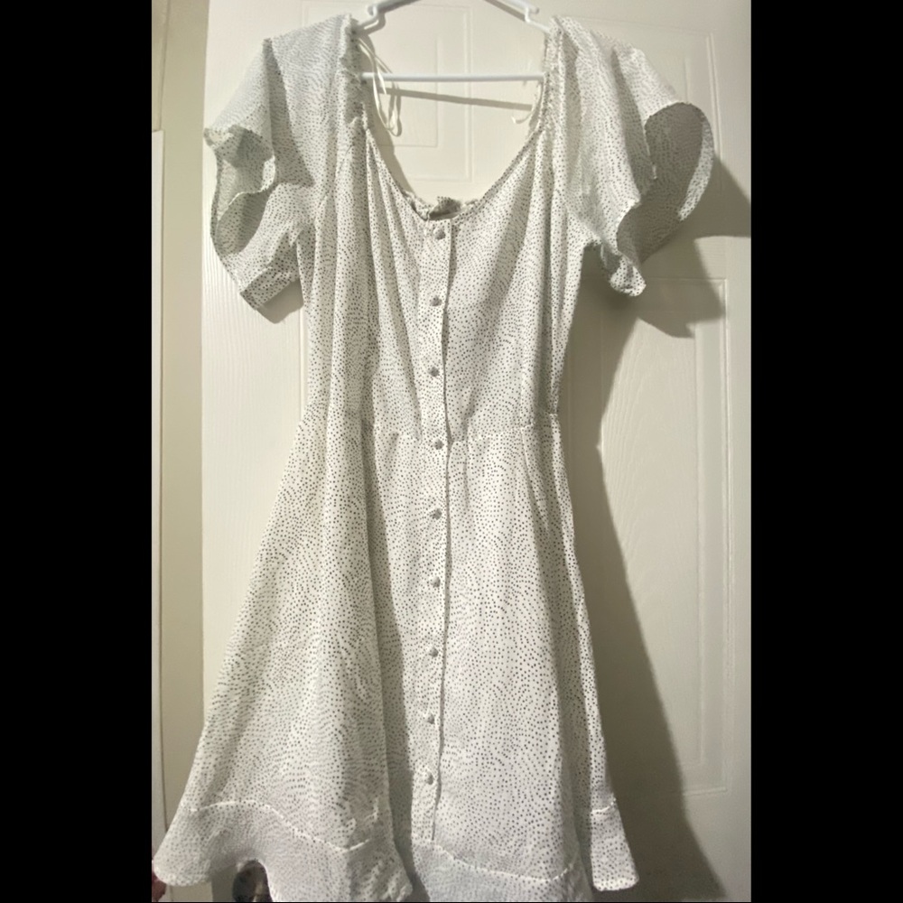 polka dotted white flowy dress
